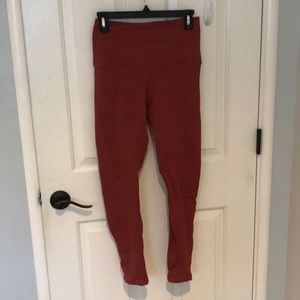 Reddish/copper leggings